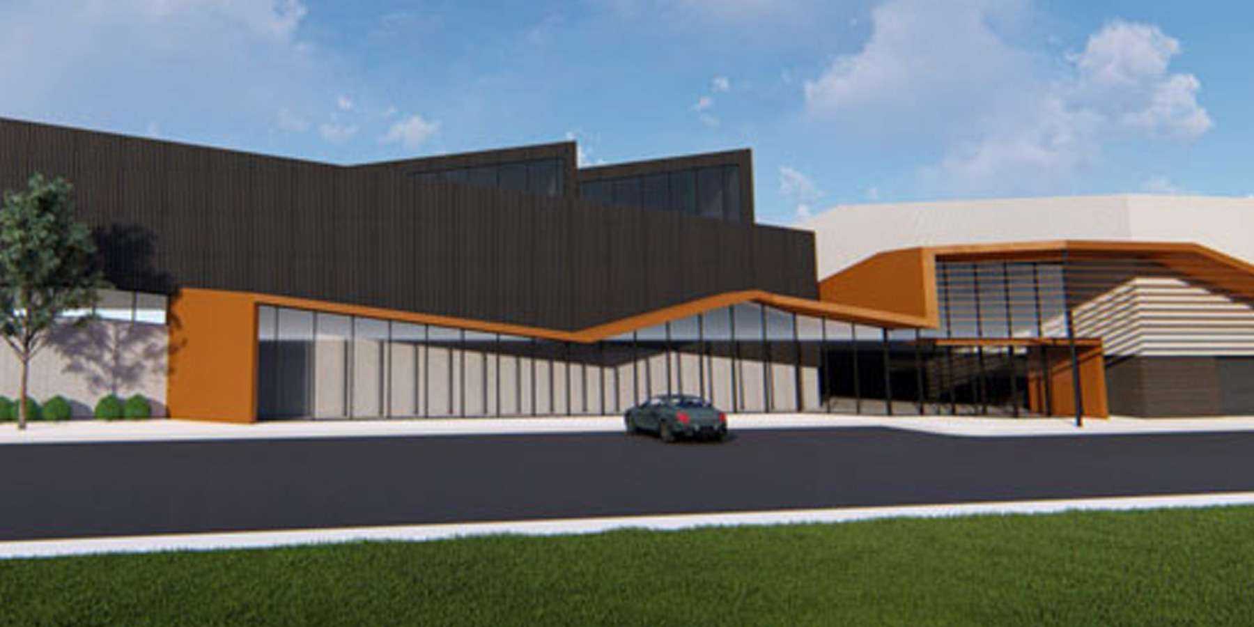 Modern architectural rendering of a multi-level building with a mix of dark and orange facades, surrounded by green landscaping and a blue sky.