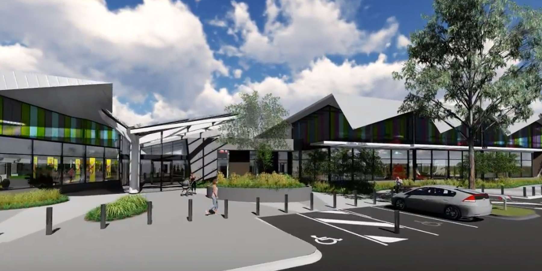 Modern architectural design featuring multiple structures with angular roofs, surrounded by greenery and a sunny blue sky.