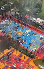 Image displays an overhead view of multiple courts in various colours including blue, yellow, orange, red, purple with images of characters