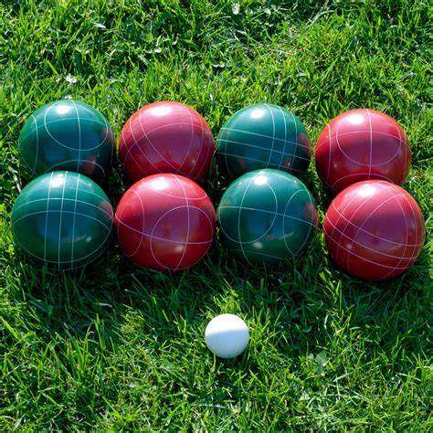 An image of red and green Bocce balls