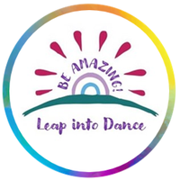 a round circle with rainbow colours around the outside and rainbow coloured text.